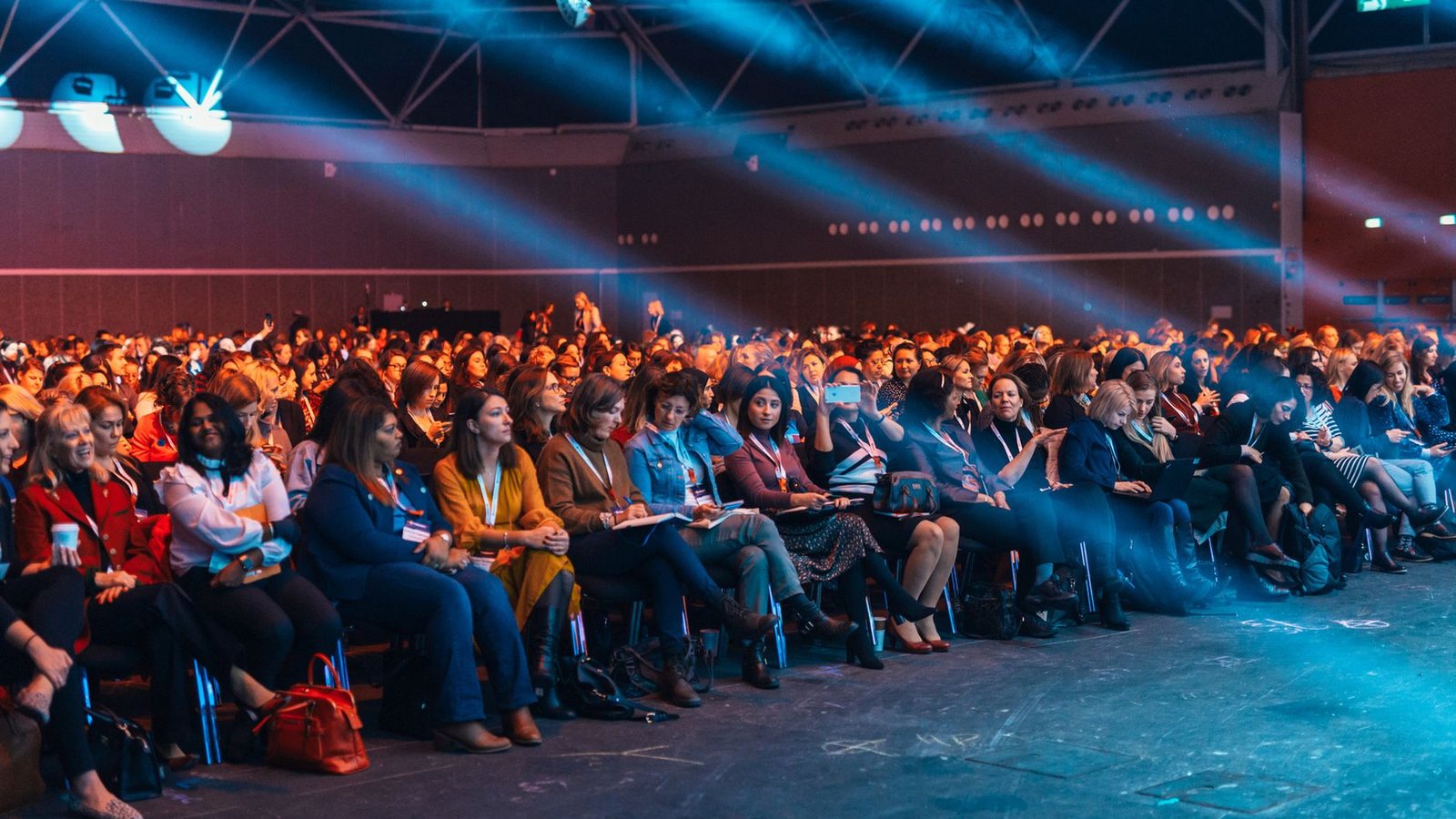 Conference audience watching a session at a games industry event